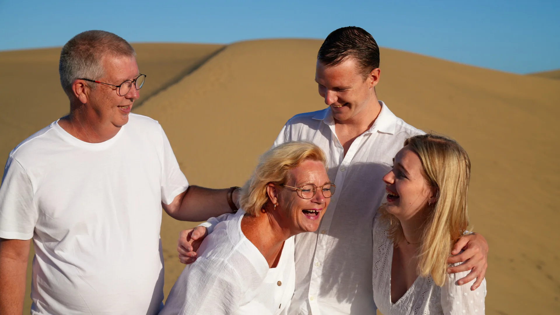 Family laughing on the dunes Gran Canaria