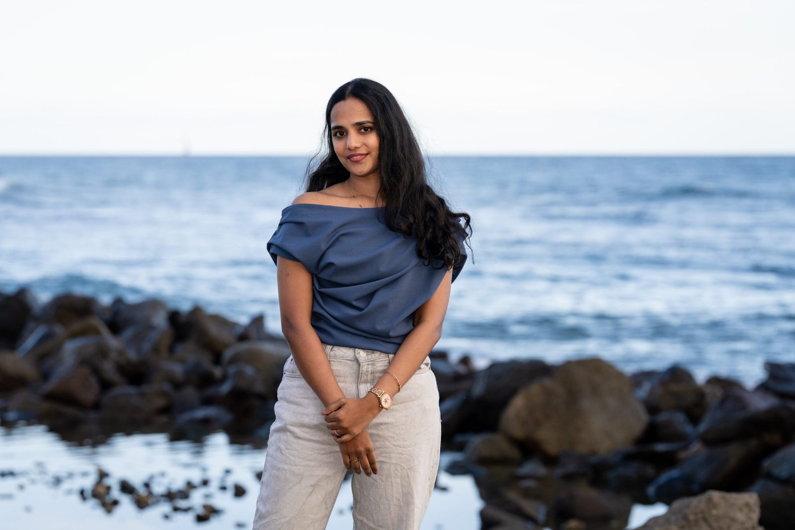 Woman portrait rocky beach