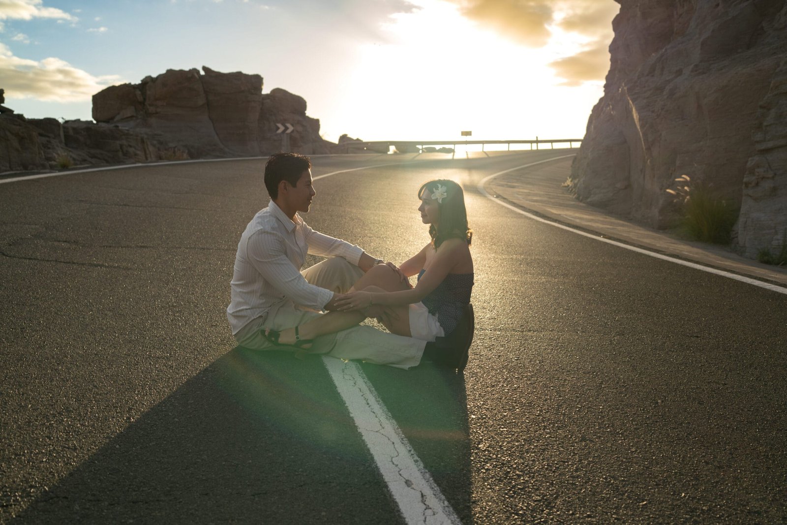 Couple at sunset road