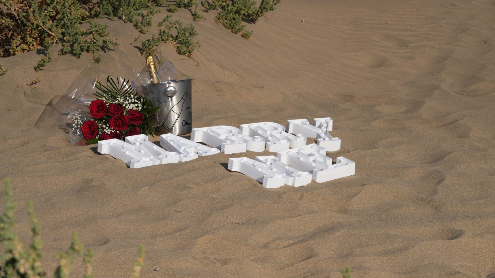 Marry Me proposal setup beach