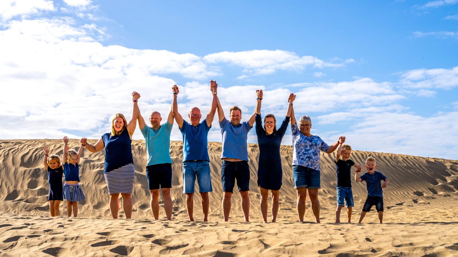 Large family group on dunes Gran Canaria
