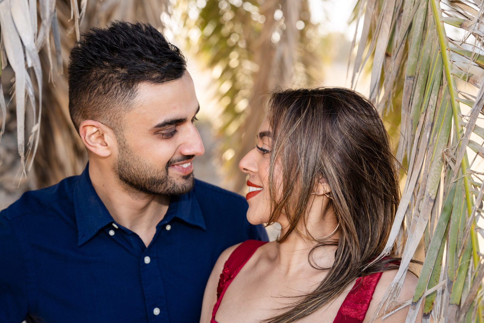 Intimate couple portrait palm trees