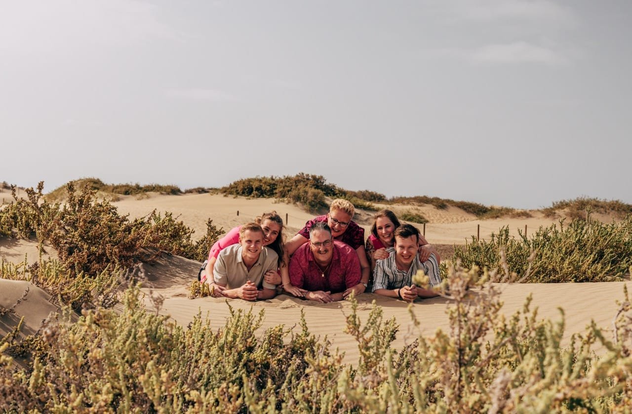 Family relaxing on the dunes Gran Canaria