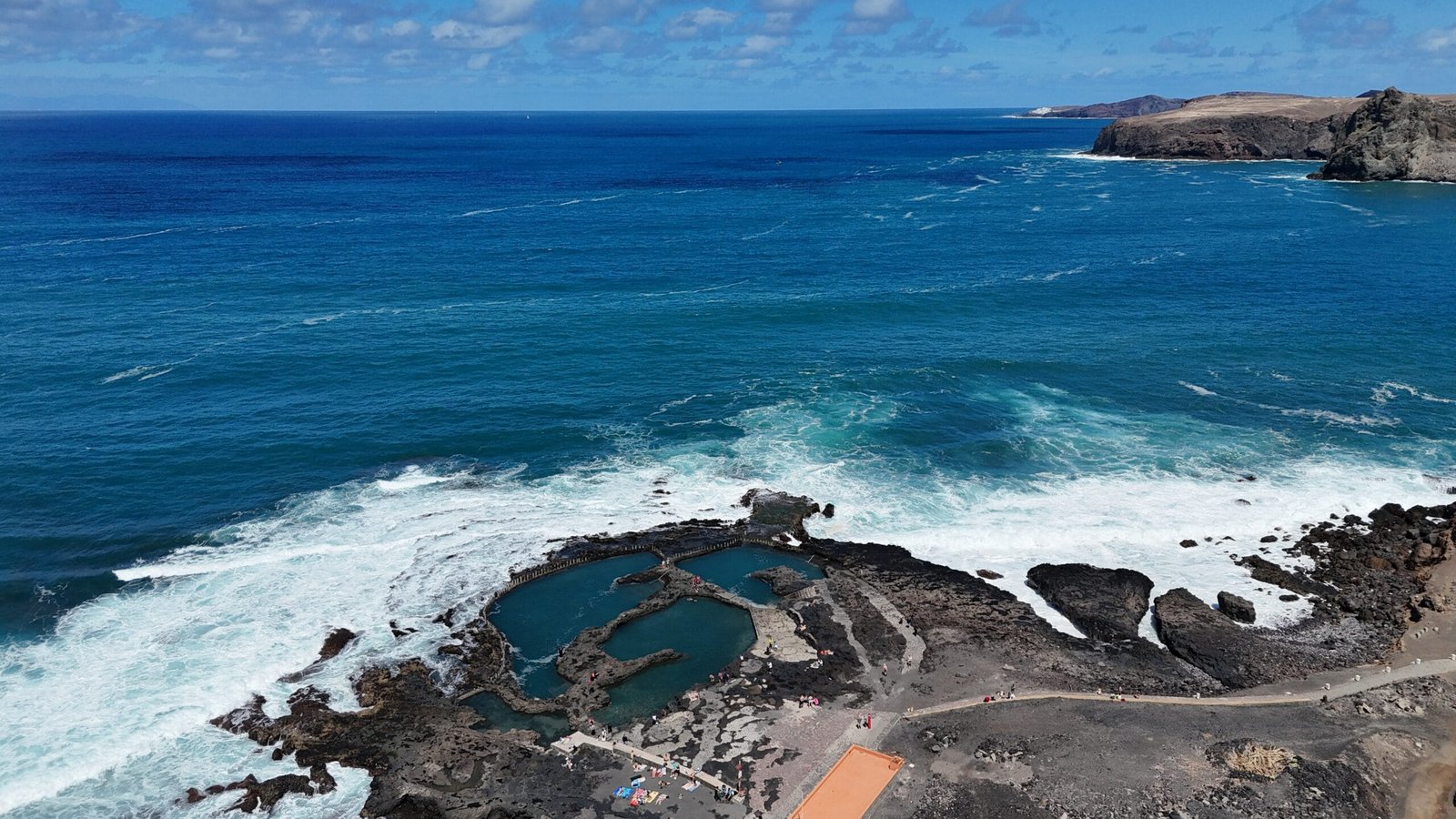 Aerial drone view natural pools Agaete volcanic coastline Gran Canaria Atlantic ocean