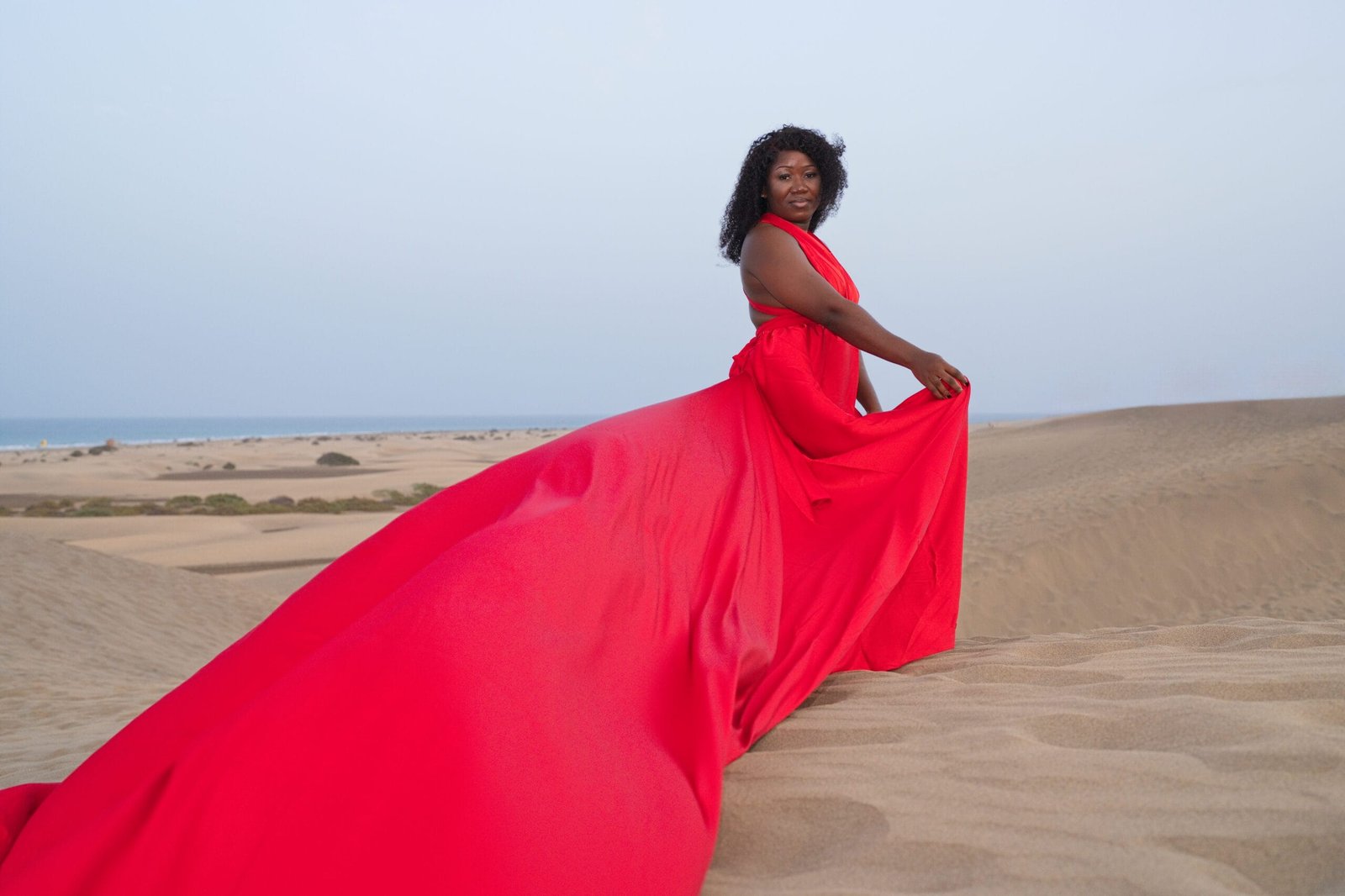 Solo flying dress photoshoot crimson red gown Gran Canaria