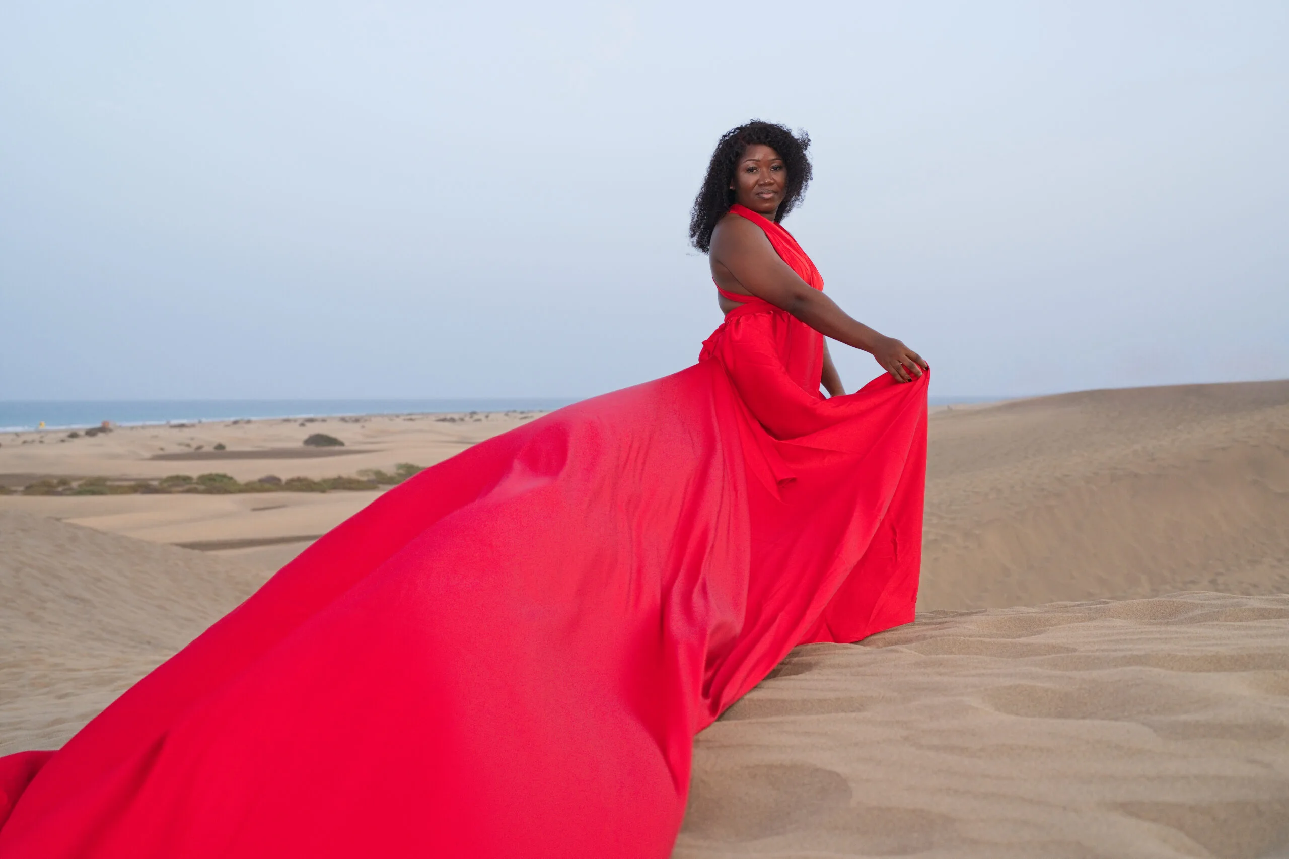 Solo flying dress photoshoot crimson red gown Gran Canaria
