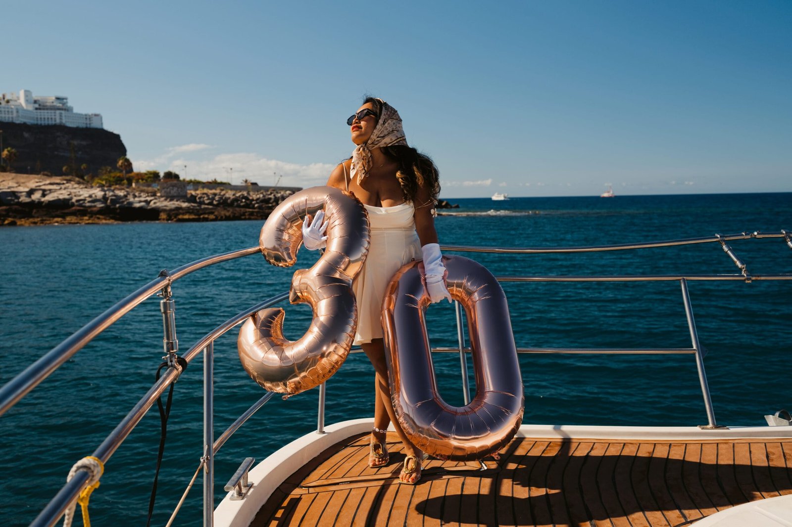 30th birthday photoshoot with rose gold balloons on a private yacht Gran Canaria